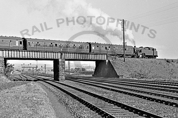 42105 leaving Carnforth 270865  PF105