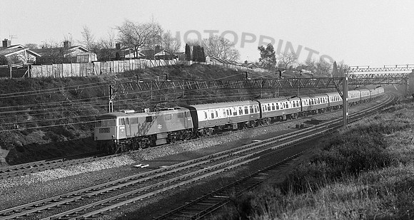 83012 E3035-now  preserved - down express at Whitmore on 29.1.77 - Peter Fitton